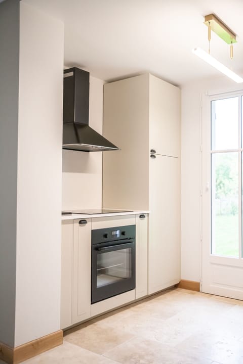 Luxury Suite | Private kitchen | Espresso maker, coffee/tea maker, electric kettle, dining tables