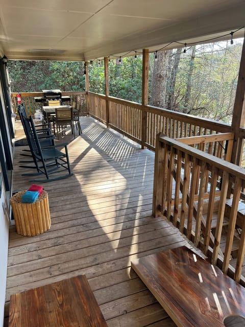 Enjoy the treetop breezes while you laugh together and play cornhole!