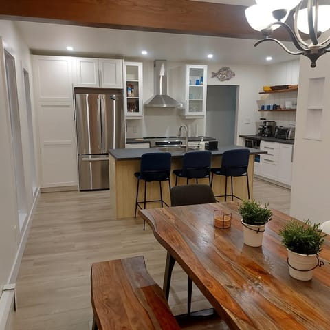 Coffee, bar and desk in kitchen with direct wired Internet.