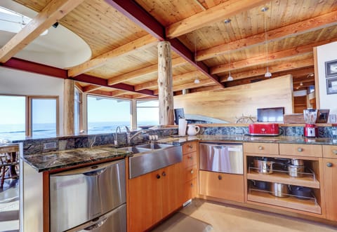 The kitchen is well stocked with quality dishware, dinnerware, and bakeware.