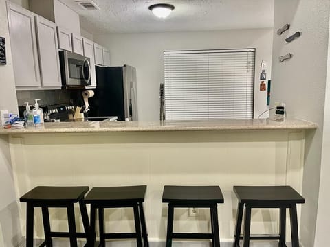 Bar stools for additional guest with buffet arrangement.