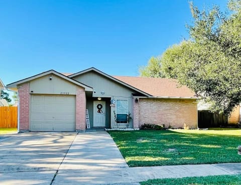 Garage can hold one car, 2-3 cars can be accommodated on the driveway.