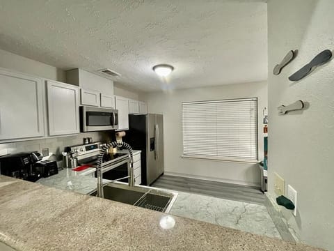 Overlooks the Kitchen Counter