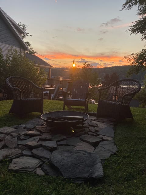 Beautiful sunset from the back yard & live firepit