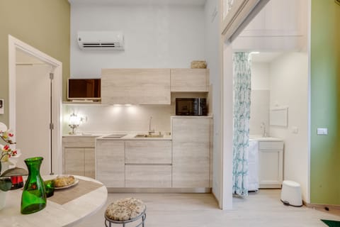 Apartment, 1 Bedroom | Private kitchen | Full-size fridge, microwave, stovetop, dishwasher