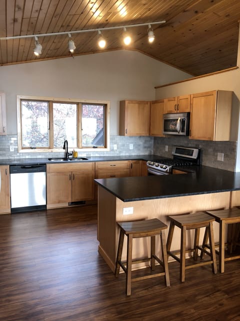 Additional bar seating at the huge kitchen island