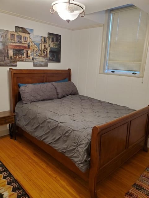 Bedroom w/queen size bed, dresser, closet, and ceiling fan