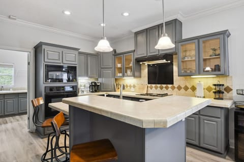 Large Kitchen with everything you need.  Pots, pans, dishes and more.  