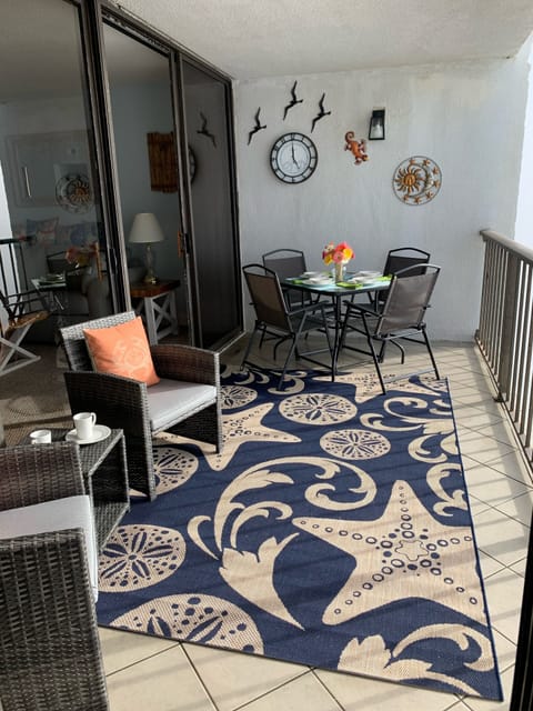 Enjoy the sights and sounds of the ocean on your spacious balcony 🌊