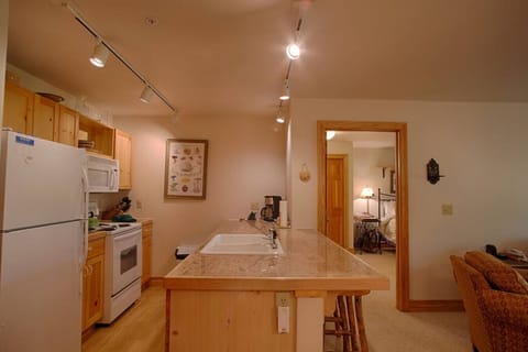 Kitchen with bar and extra seating