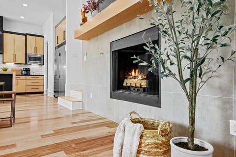 Our working gas fireplace is the centerpiece of our downstairs living space.