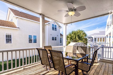 The back deck has great seating a large gas grill