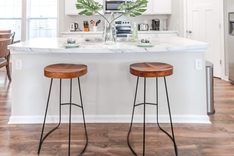 Pull up a stool at the kitchen island and keep the chef company!
