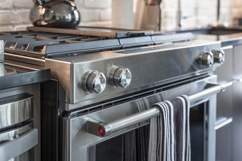 Kitchen features top-of-the-line appliances.