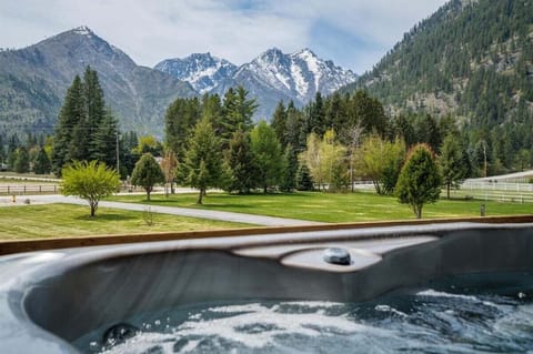 Relax in a hot tub with unrivalled views of the Sleeping Lady