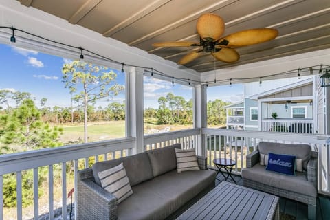 Large screened in balcony is the perfect spot for evening cocktails