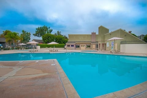 - Refresh in the sparkling swimming pool perfect for a morning dip or afternoon swim   - Surrounded by lounge chairs and shaded umbrellas for your comfort   - Community pool offers a relaxing retreat during your stay