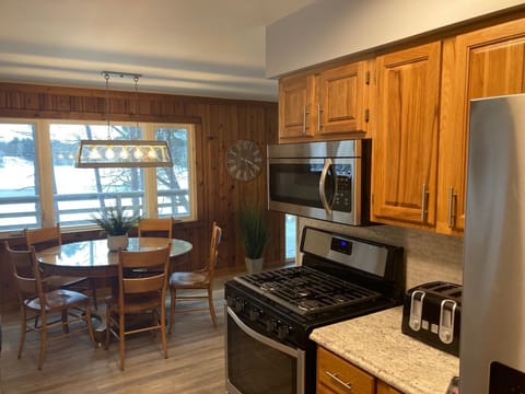 Kitchen, fully functioning with microwave, stove, fridge, dishwasher 