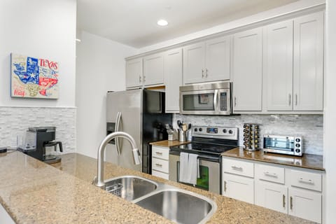 Kitchen with all the supplies you’ll need to make your favorite meals. 