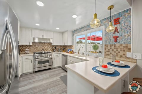 Impress your guests at this stylish kitchen with bar seating
