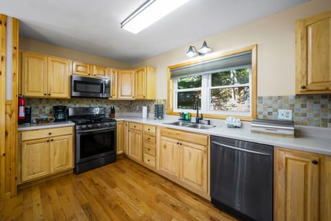 The gas stove, dishwasher, and large fridge will make long stays feel like home.