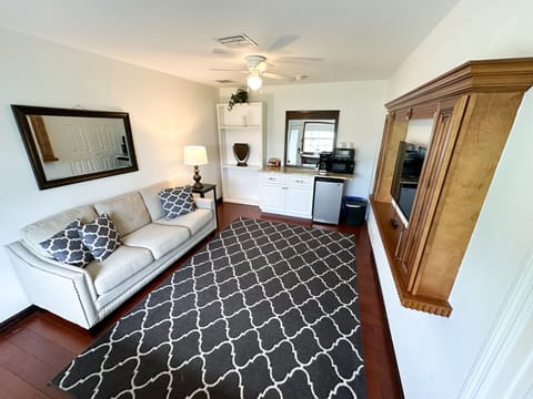 Built in kitchenette with mini fridge, toaster oven, microwave and drip coffee.