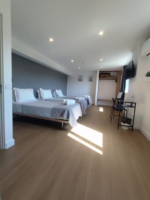 Classic Triple Room, City View | Hypo-allergenic bedding, free WiFi