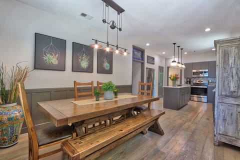 Rustic dining area with overhead lighting