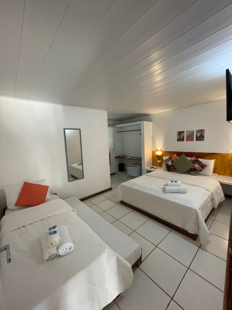 Basic Quadruple Room | Minibar, free WiFi, bed sheets