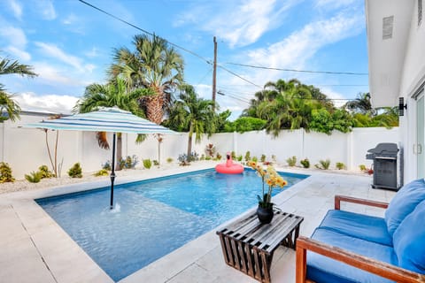 Sparkling Pool Area with Ample Seating