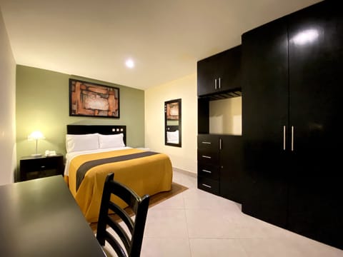 Economy Room | Desk, WiFi (free), bed sheets