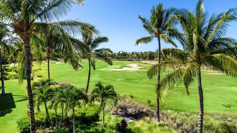 Mountain, lake, and golf course views from the covered lanai