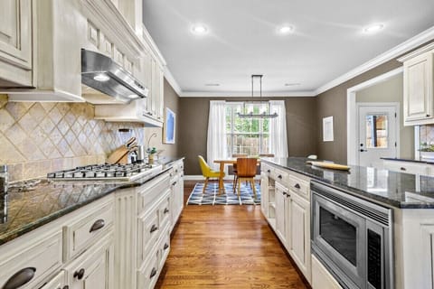 Back inside, enjoy our large kitchen with dining area.