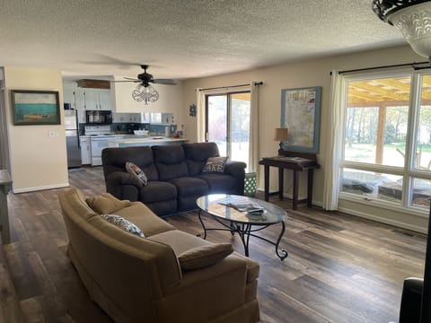 Open floor plan with plenty of seating with lake views.