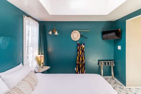 Bedroom area has beautiful natural light with windows and a large sunlight. 