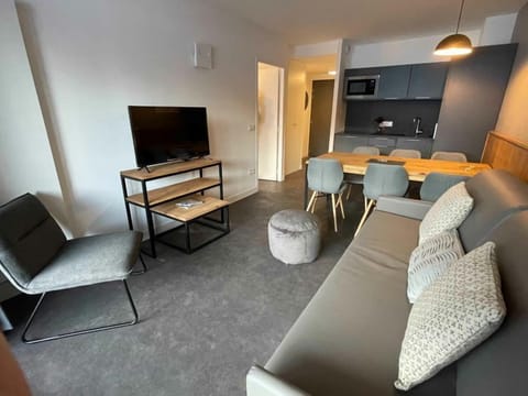 Kick back your feet and relax in the cozy living area.