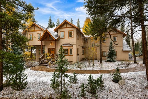 Spacious Breckenridge retreat framed by evergreens and scenic mountain surroundings.