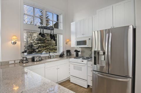 Kitchen - Cozy kitchen with great counter space and wonderful lighting