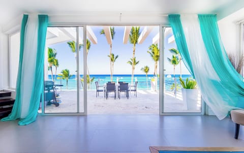 Your perfect 4-bedroom beachfront gateway!
