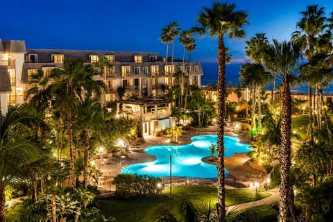 Calming pool and tropical landscaping at North Coast Village