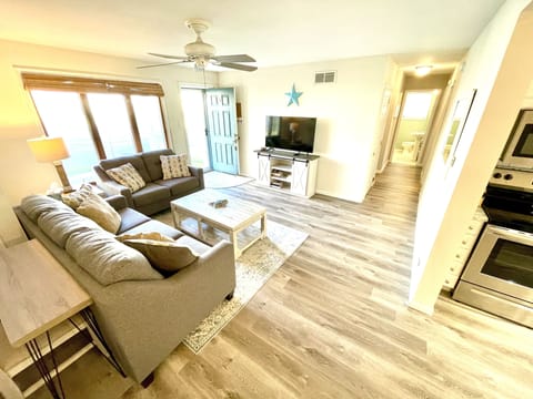 living room with  work space, smart Roku TV