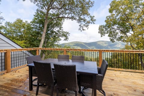 Enjoy a meal at the outdoor eating area with this mountain view as your backdrop