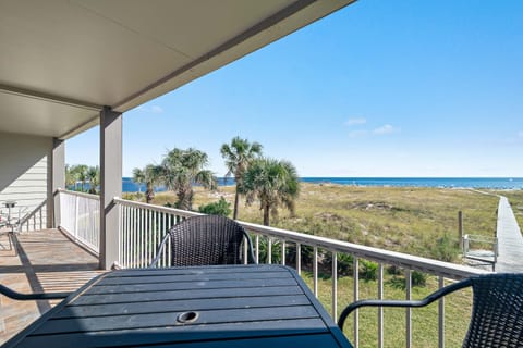 Discover unparalleled beachfront living. This exceptional view captures the essence of coastal tranquility, with a direct path leading to the sand. Secure your retreat and enjoy the revitalizing Summer Breeze today.