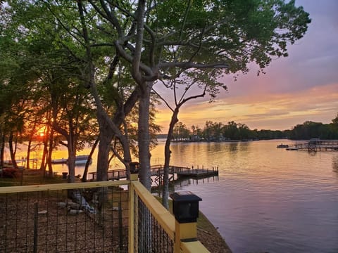 Sunset off Boathouse Deck.  Enjoy this beautiful lakefront setting