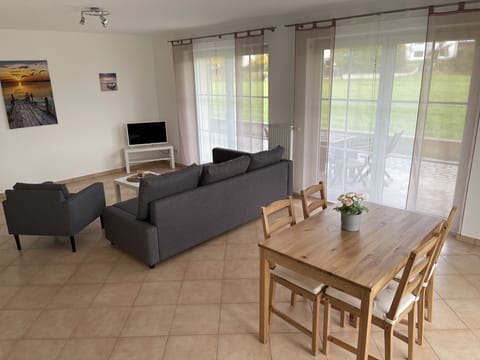 Basic Apartment | Living area | 28-inch LCD TV with satellite channels, TV