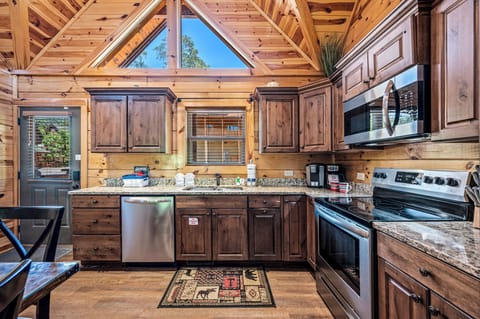 The kitchen extends from the lounge in the open-plan space.