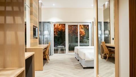 Deluxe Room | In-room safe, desk, blackout drapes, iron/ironing board