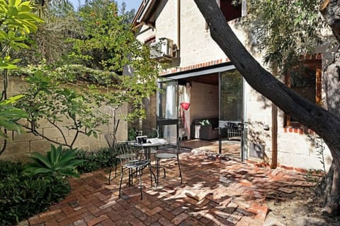 Rear shady courtyard under the Old Olive trees