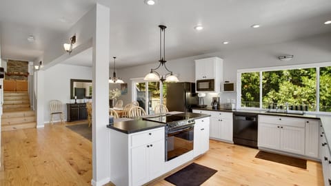Kitchen island with electric stove and oven