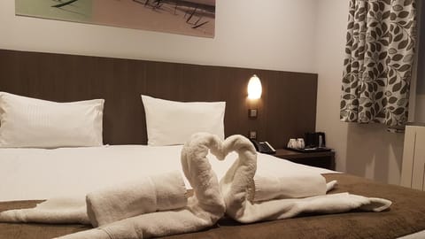 Minibar, desk, blackout drapes, soundproofing